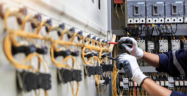 Professional Electrician technician working in Lowell, NC